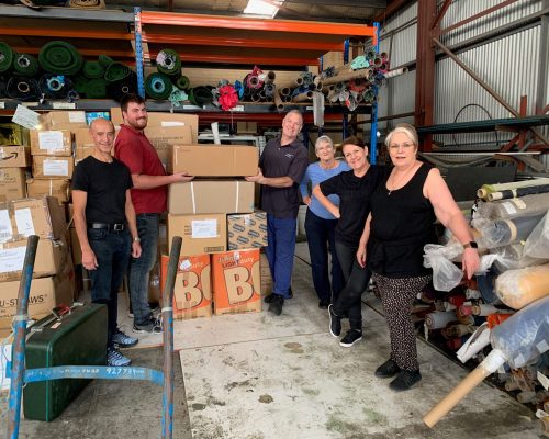 carol & her team packing a 40ft container of donated sewing items to be shipped to bpw lebanon to assist micro sewing projects after the beirut blast, 2021